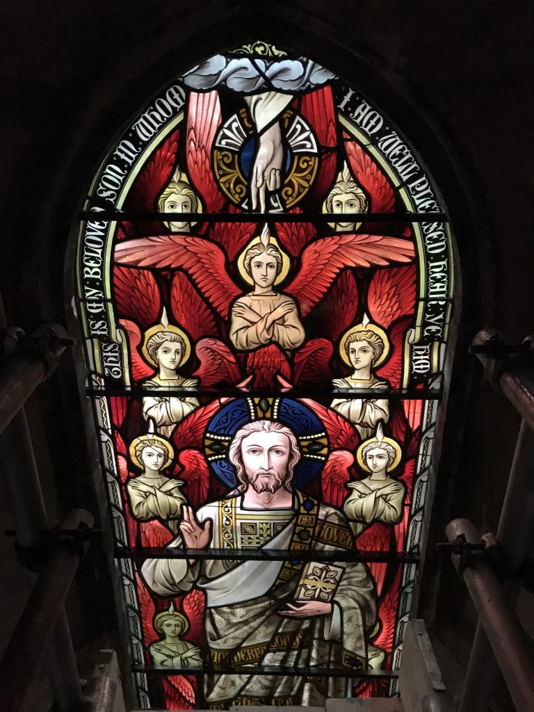 Stained glass depicting Christ and angels